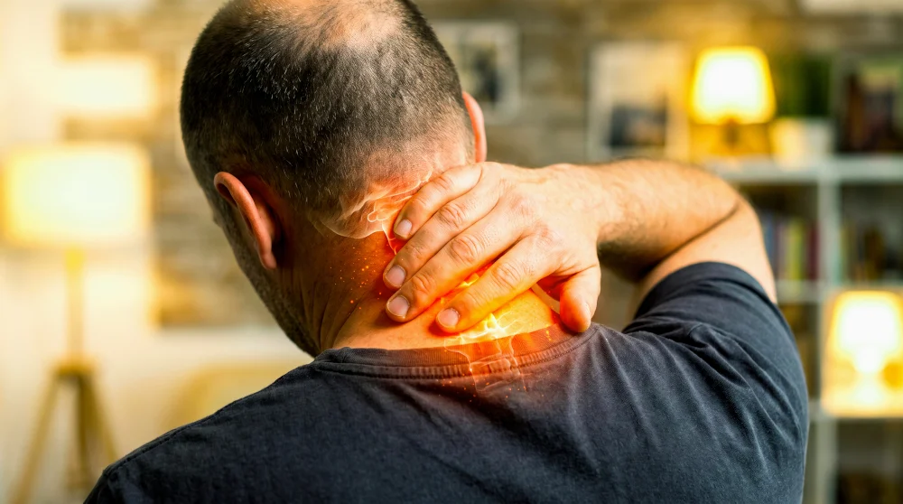 Cervical Degenerative Joint Disease An illustration of cervical degenerative joint disease causing neck pain, an advanced spinal condition treated with spinal decompression in Jupiter.